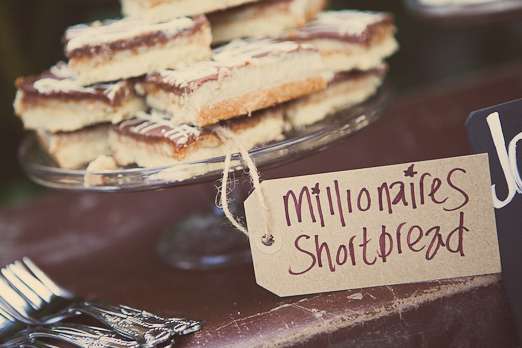 Millionaires shortbread on glass cake stand