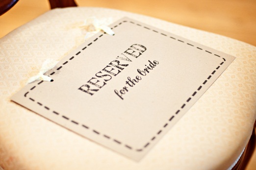 Brown card 'reserved' wedding sign