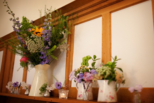 Country wedding flowers in jugs
