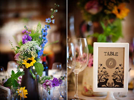 Brown craft table numbers and country garden flowers