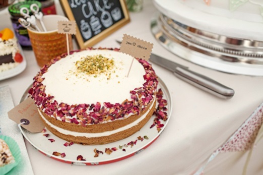 Homemade wedding cake with rose petals