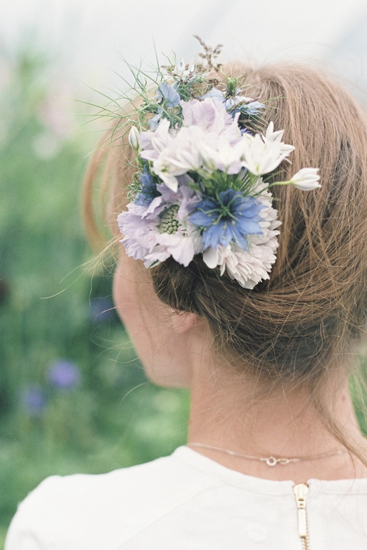 Swedish style braided wedding hair with seasonal flowers
