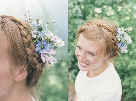 Pastel blue wedding hair flowers in a braid