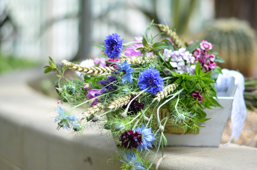 Seasonal bouquet with golden wheat, cornflowers and love-in-a-mist
