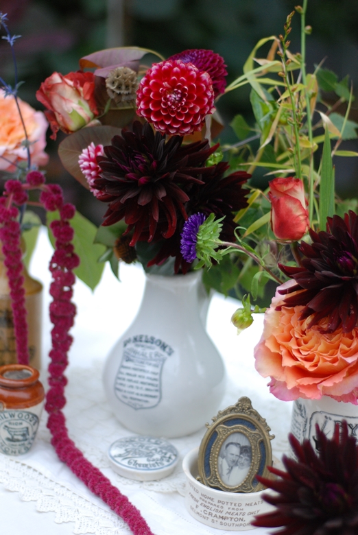 Vintage jugs of dahlias, garden roses and amaranthus by Fletcher & Foley