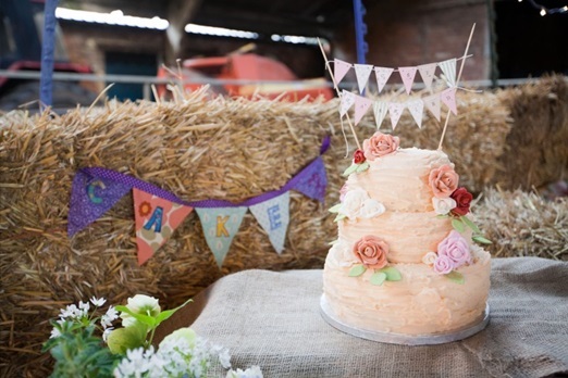 Homemade wedding cake with mini bunting – photography http://www.milestones-photography.co.uk/ 