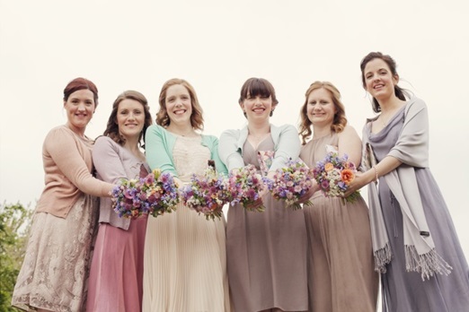 Mismatched pastel bridesmaid dresses and flowers – photography http://www.milestones-photography.co.uk/ - flowers http://www.catkinflowers.co.uk/ 