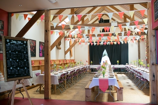 Bunting decorated wedding barn – photography http://www.rebeccaroundhill.co.uk/ 
