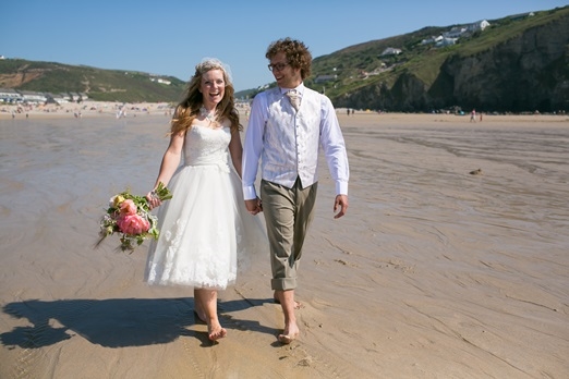 Bride and groom on Cornish beach – photography http://www.rebeccaroundhill.co.uk/ 