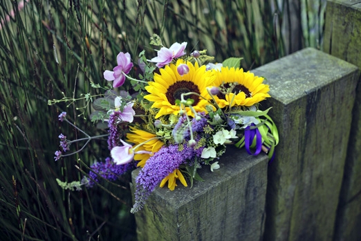 Seasonal bridal bouquet with sunflowers and buddleia – photography http://www.mark-tattersall.co.uk/