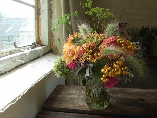 Wild and natural seasonal bouquet of dahlias and grasses by http://www.thebluecarrot.co.uk/
