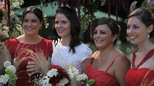 Ciara and Matt's relaxed outdoor wedding with vibrant red accents, handpicked florals and an amazing eclectic reception – photography http://www.brightstarfilms.co.uk/