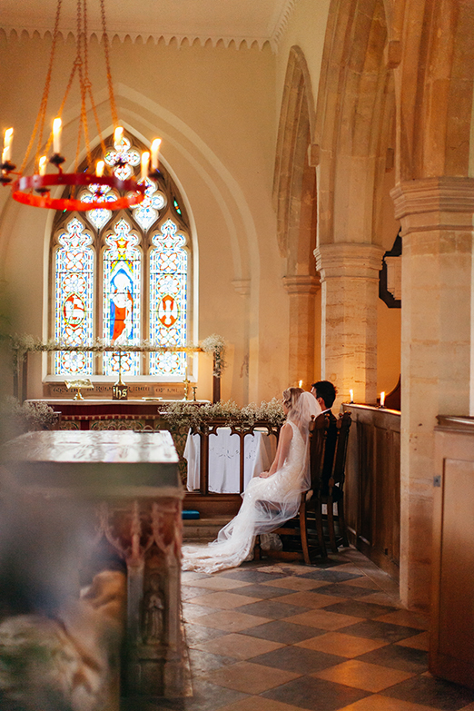 Candlelit church wedding ceremony - – photography http://www.bohemianweddings.co.uk/