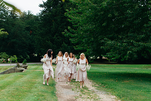 Elegant bride with bridesmaids in long blush coloured dresses – photography http://www.bohemianweddings.co.uk/ 