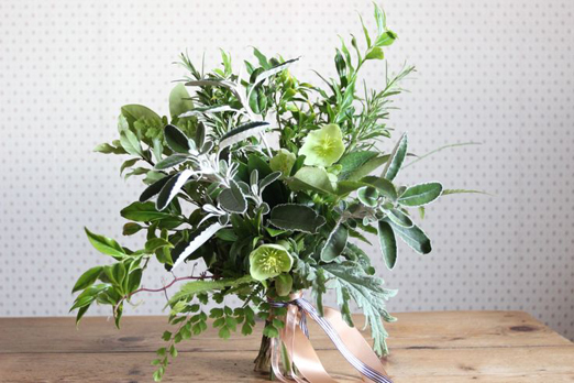 Green winter wedding bouquet of hellebores, ferns and foliage // Blue Poppy Florist