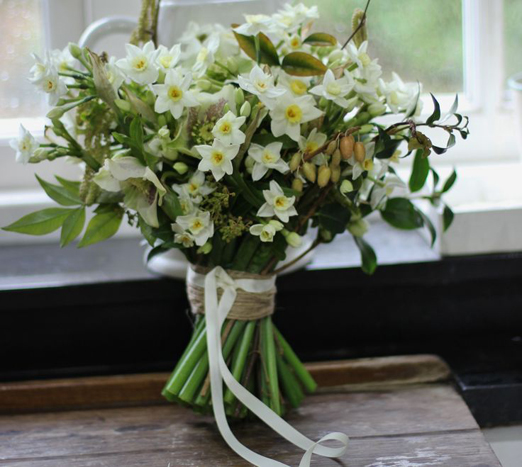 White and green winter wedding bouquet of hellebores, narcissi and foliage // Lock Cottage Flowers