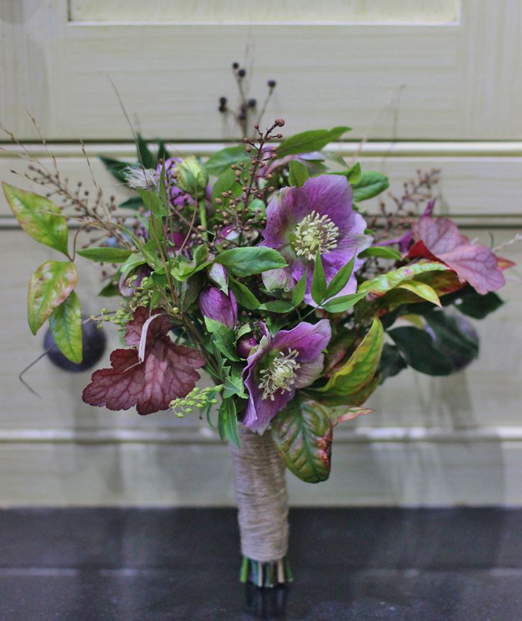 Winter wedding bouquet of berries, hellebores, and purple foliage // Lock Cottage Flowers
