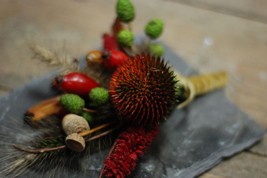 Seasonal autumn buttonholes of Echinacea, acorns and rosehips by Fletcher & Foley // The Natural Wedding Company