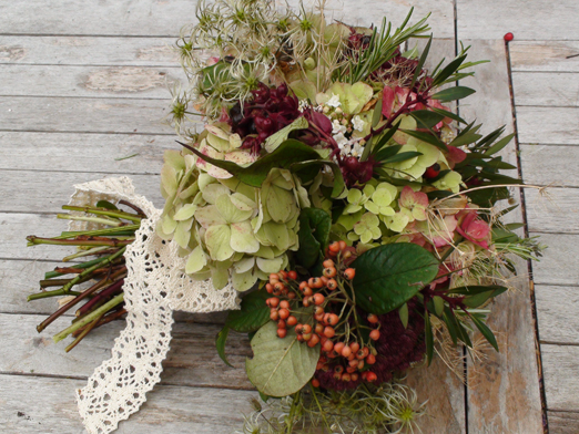 Autumn wedding bouquet of Hydrangea, berries and old man's beard by Foxgloves & Roses // The Natural Wedding Company