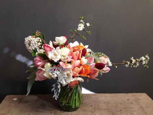 Spring wedding bouquet of tulips, blossom and dusty miller // The Garden Gate Flower Company