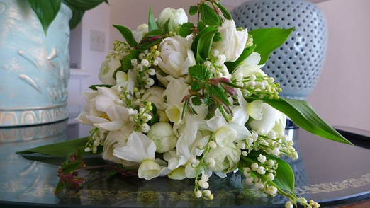 White seasonal spring bouquet of yulips, lily of the valley and narcissi // Windmill Farm Flowers