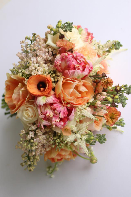 Peach and pink coloured spring bouquet with tulips, lilac and ranunculus // Cherfold Cottage Flowers
