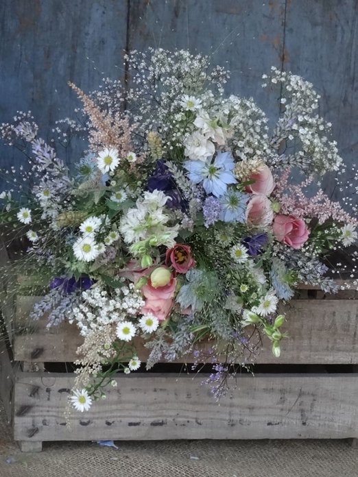 Summer wedding bouquet of Grasses, lavender and gypsophila by Catkin Flowers // The Natural Wedding Company