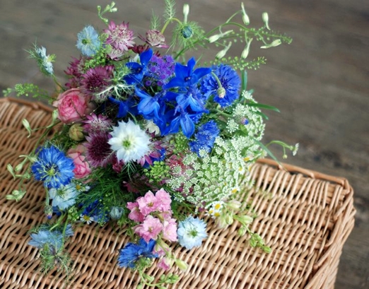 Summer bridal bouquet of Love-in-a-mist, ammi and larkspur by Fletcher & Foley // The Natural Wedding Company
