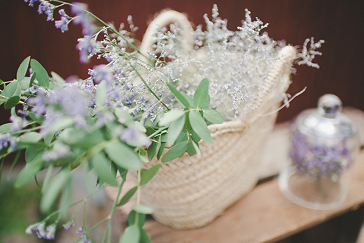 Basket of olive branches and wildflowers // photography www.padilla-rigau.com 
