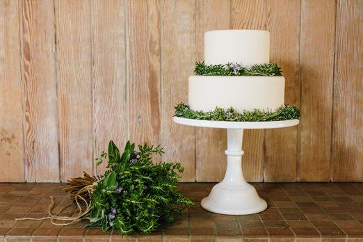 A rustic wedding bouquet of fragrant herbs and a wedding cake decorated with flowering rosemary // Miki Vargas Photography // styling A Monique Affair // flowers Laura Miller Designs // cake Cakes Made By M.E.