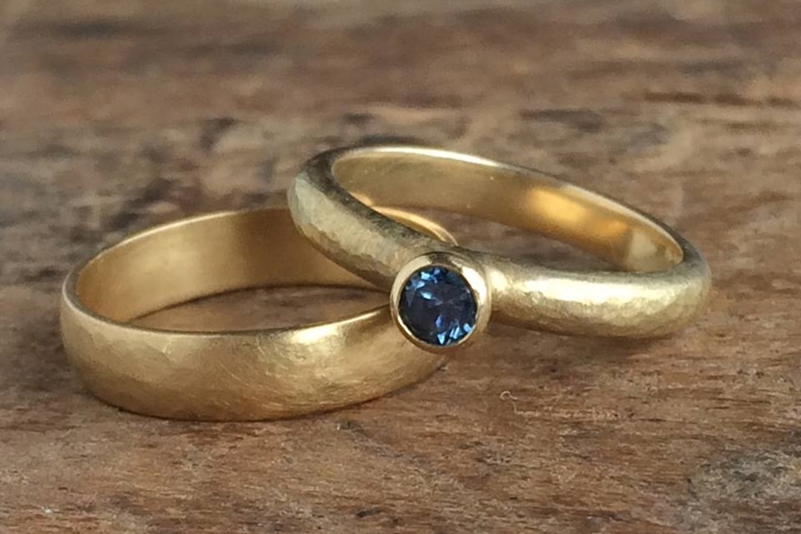 Ethical recycled gold wedding band and sapphire engagement ring from Glasswing Jewellery // The Natural Wedding Company