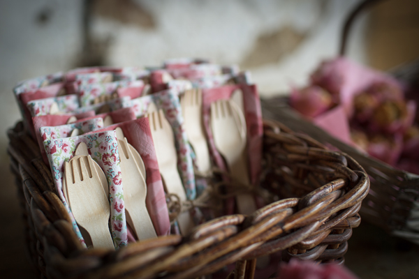 Biodegradable wooden cutlery with floral napkins // Photography Belinda McCarthy // The Natural Wedding Company