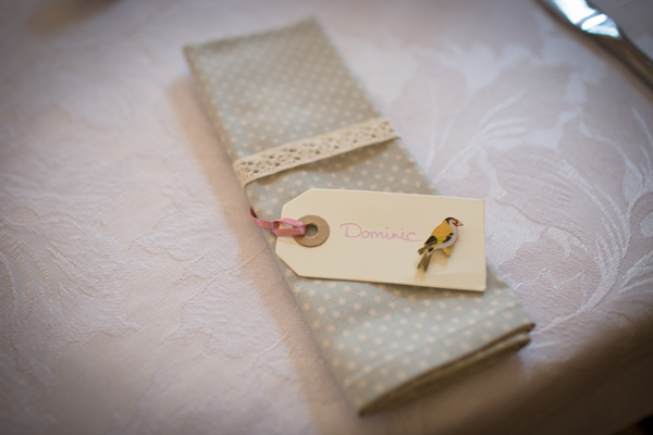 Vintage style napkins with bird pin wedding favours // Photography Belinda McCarthy // The Natural Wedding Company