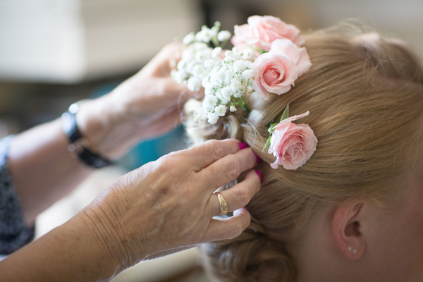 Gypsophila and pink rose wedding hair flowers // Photography Belinda McCarthy // The Natural Wedding Company