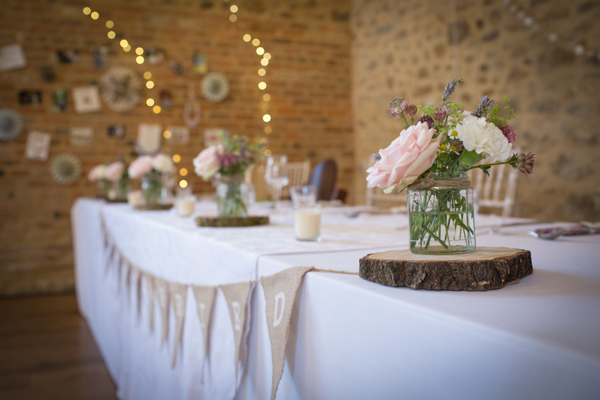 Hessian and country flower wedding tables // Photography Belinda McCarthy // The Natural Wedding Company