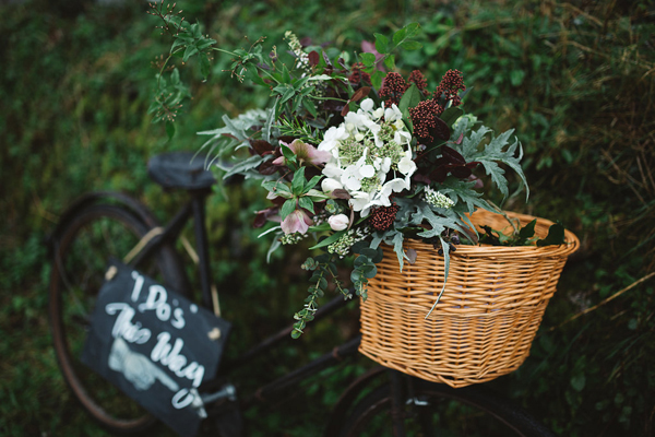 Spring bouquet on a vintage bike // Rainy romantic wedding shoot // Box and Cox Vintage Hire // The Natural Wedding Company