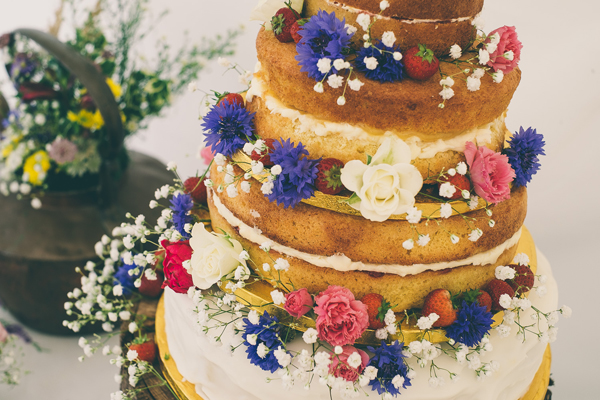 Naked wedding cake with flowers // Lucy Jane Photography // The Natural Wedding Company
