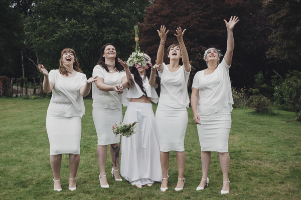 Bridesmaids in white for Hannah & Gregg's modern folk wedding at an English manor house // Oxi Photography // The Natural Wedding Company