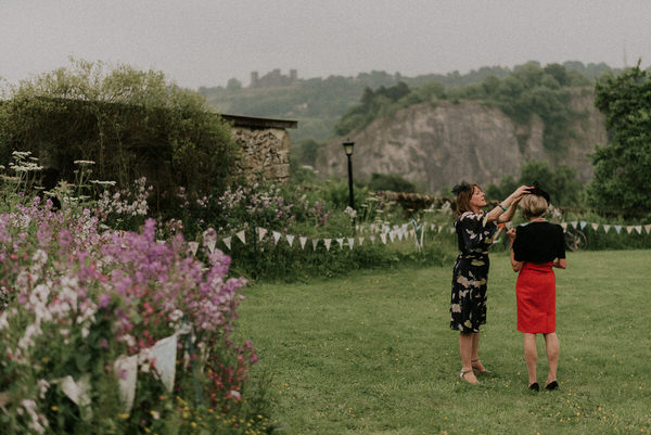 Kate and Aidan's outdoor eco wedding with a hike to the venue, mountain biking, and cornflowers in beer bottles // Scuffins Photography // The Natural Wedding Company