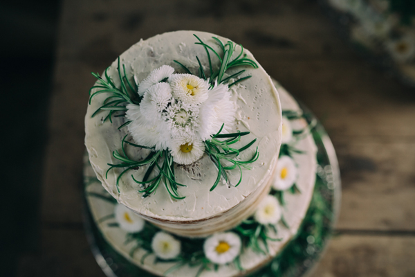 Naked wedding cake decorated with edible flowers // Enchanted Brides Photography // The Natural Wedding Company