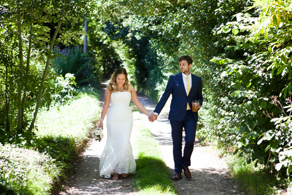 Kim and John's fun garden party wedding on the Isle of Wight with an outdoor ceremony and a Bride vs Groom game of rounders // Taylor Wolf Photography // The Natural Wedding Company
