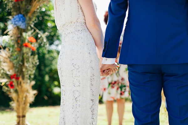 Bride and groom holding hands // Bohemian Weddings // The Natural Wedding Company