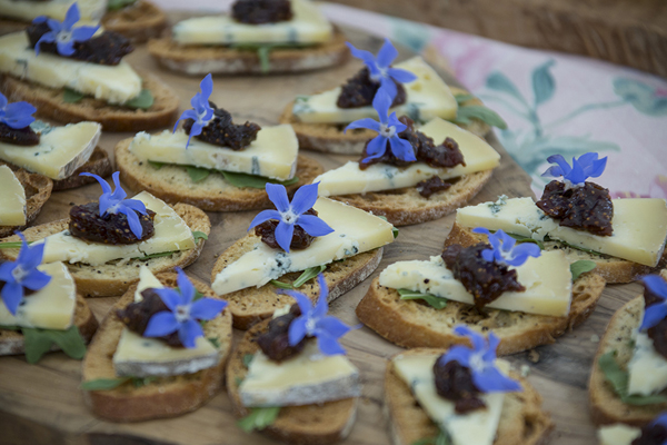 Canapes with borage flowers // Jennie Hill Photography // The Natural Wedding Company