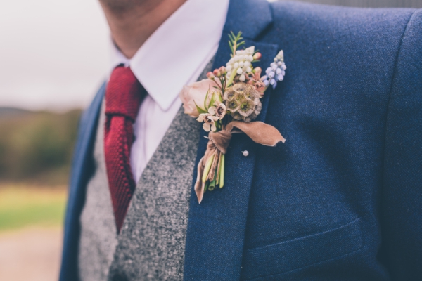 Spring buttonhole // Cosy winter wedding at River Cottage // Larissa Joice Photography // The Natural Wedding Company