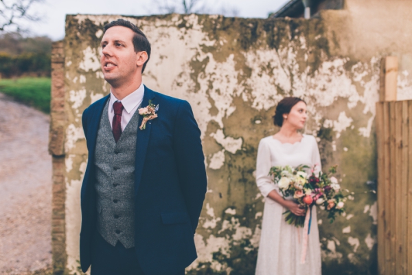 Groom in blue suit and tweed waistcoat // Cosy winter wedding at River Cottage // Larissa Joice Photography // The Natural Wedding Company