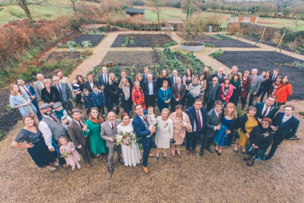 Group wedding photo // Cosy winter wedding at River Cottage // Larissa Joice Photography // The Natural Wedding Company
