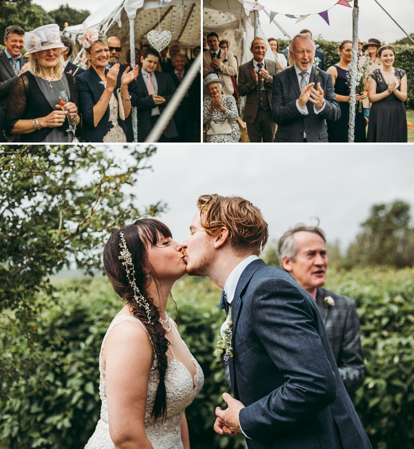 Bride and groom kiss at a garden tipi wedding // Tracey Warbey Photography // The Natural Wedding Company