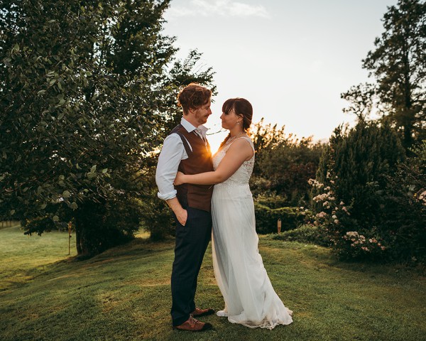 Sunset bride and groom portrait at a garden tipi wedding // Tracey Warbey Photography // The Natural Wedding Company