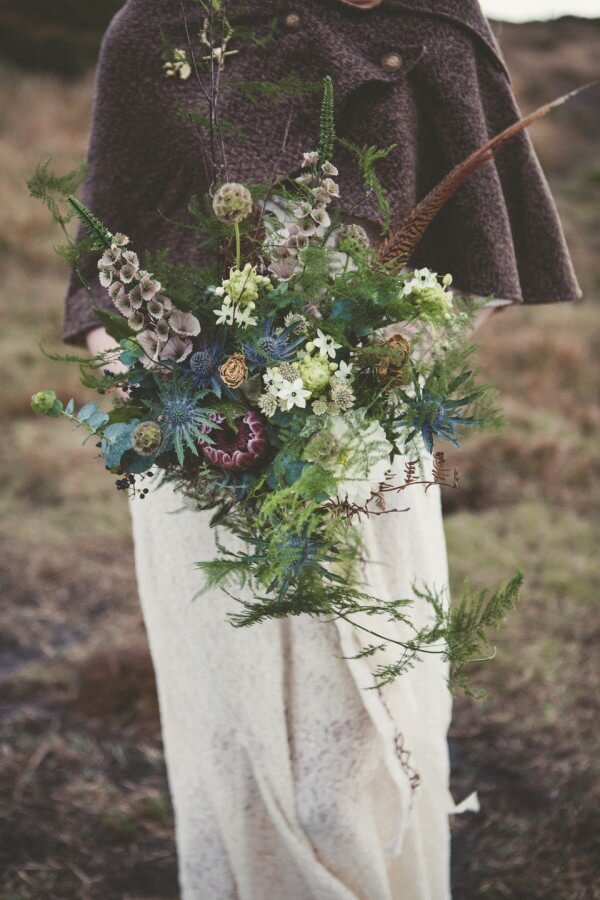 Wild bouquet with feathers - Celtic wedding inspiration // Emma Stoner Photography // The Natural Wedding Company