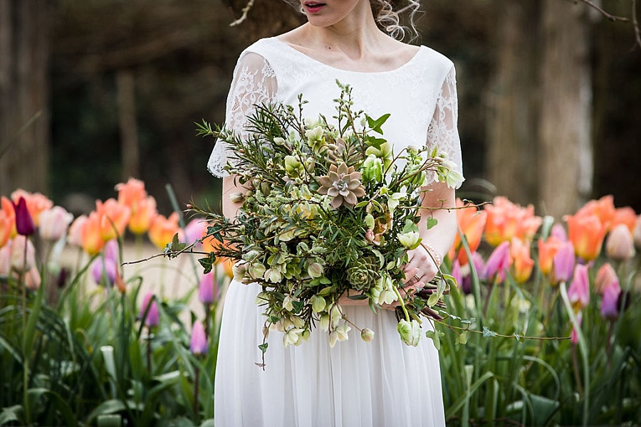 Succulent and hellebore spring wedding bouquet